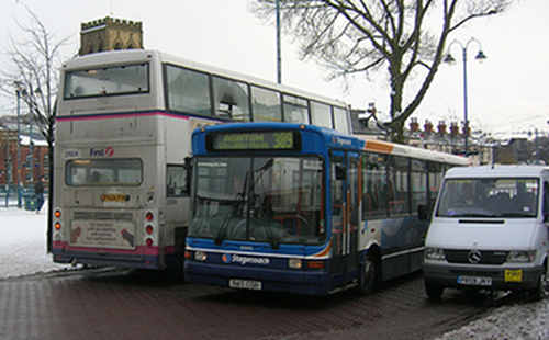 A First Pioneer Dennis Arrow, Stagecoach Manchester Marshall bodied Dennis Dart and a minibus
